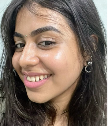 Girl smiling while sharing her Nainital skincare review